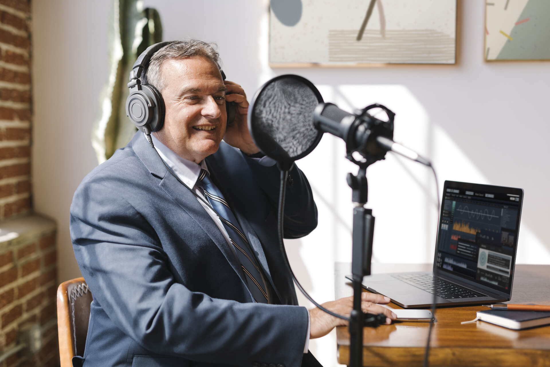 businessman-recording-a-podcast-2021-09-02-06-03-21-utc.jpg